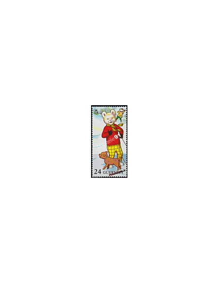 Timbee de GUERNESEY n° 602 - Rupert et son chien - timbre d'Europe