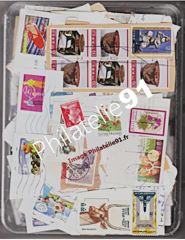 1 kilo de timbres TOUS PAYS sur fragment - TIMBRES TOUS PAYS