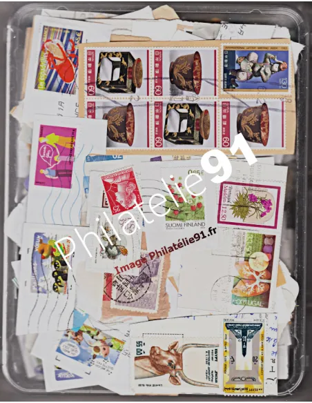 1 kilo de timbres TOUS PAYS sur fragment - TIMBRES TOUS PAYS